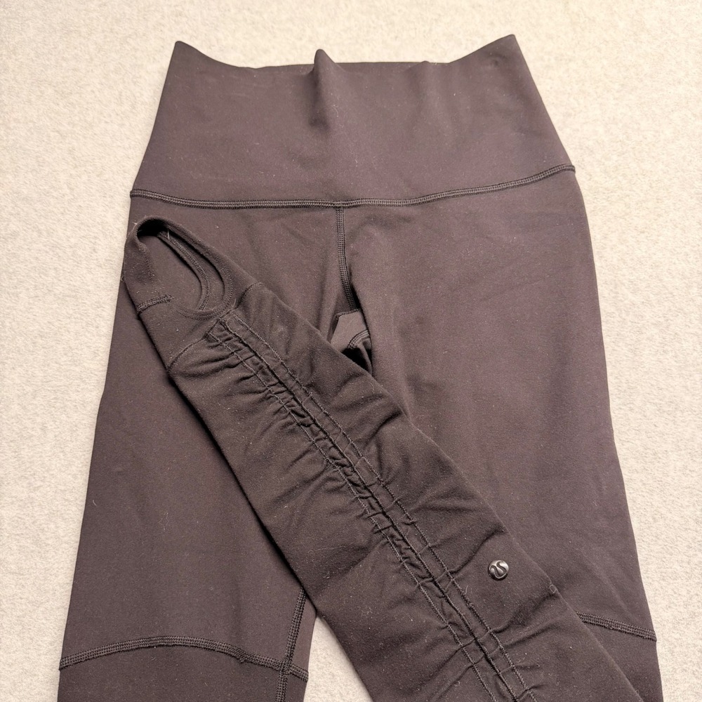Lululemon Black High Rise Ruched Stirrup Leggings Size 6 Yoga Barre Workout